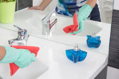 Cleaning professional using protective measures during carpet care work