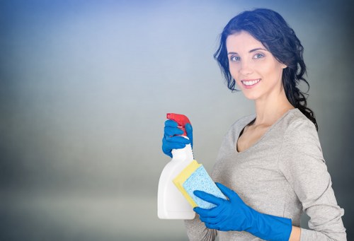Technician applying carpet cleaning treatment with care